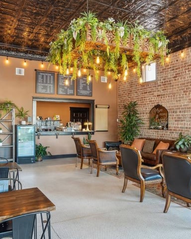 4:18 Coffee Company interior with tin ceiling and Edison bulbs